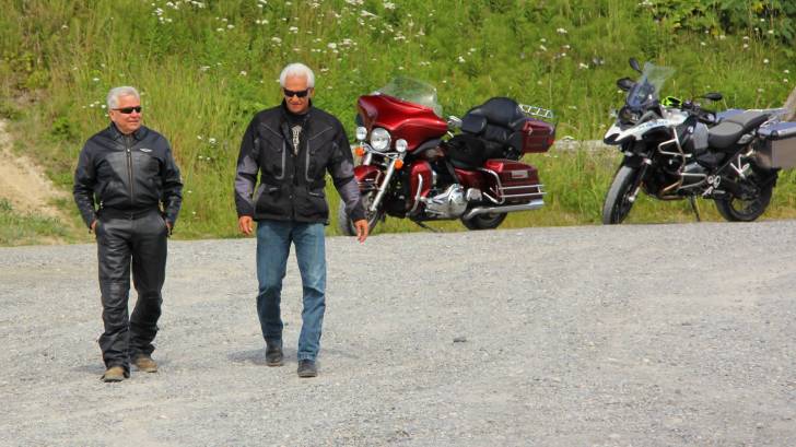 baby boomers, men, riding motorcycles.