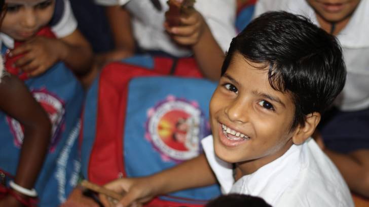 young healthy happy boy in school
