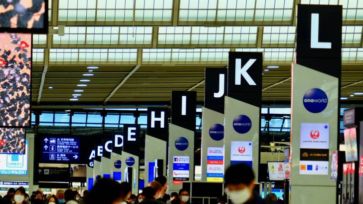 public transportation place with people with masks o to protect themselves from COVID-19