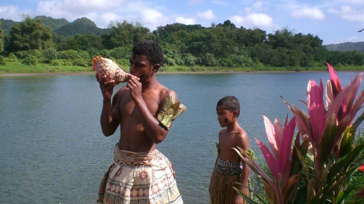 fiji island and natives on the water way