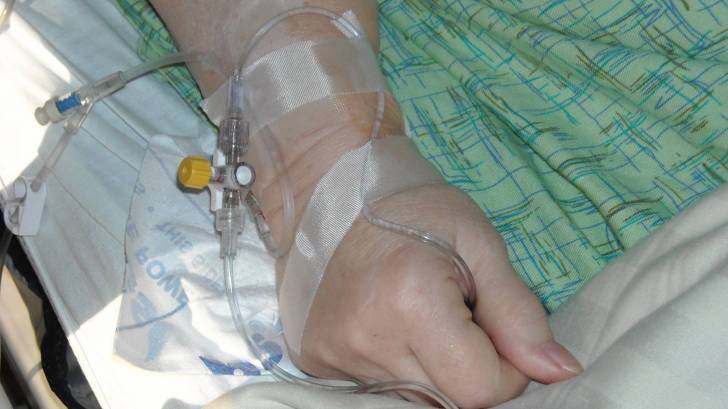 intravenous in a wrist in a hospitl setting