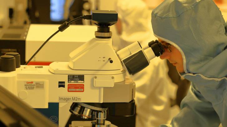 researcher working on vaccine