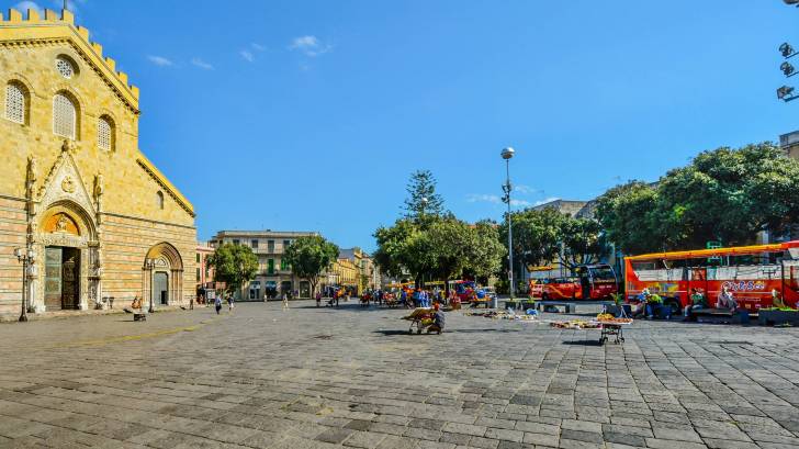 intalian church with tour buses