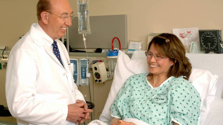 doctor talking to a cancer patient