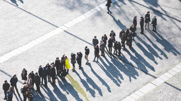 people in queue for a vaccine