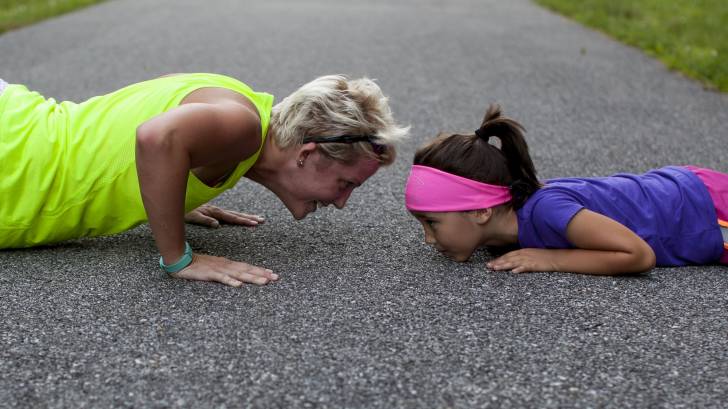 strong push ups older adult and child