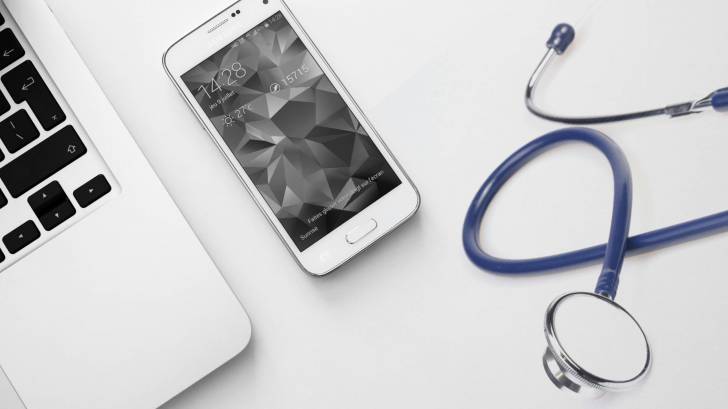 computer, smart phone and stethoscope