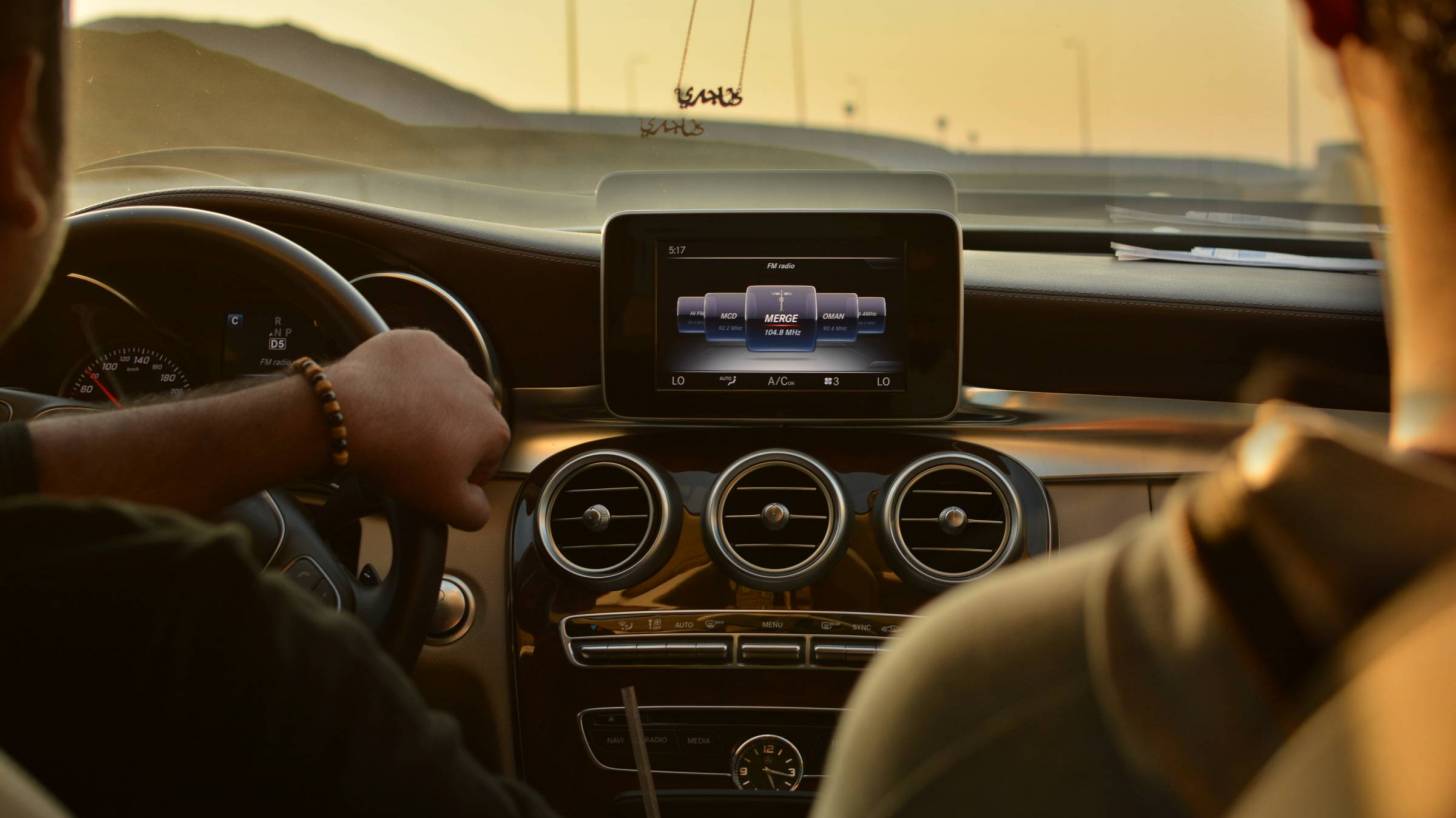 driver and passenger in car