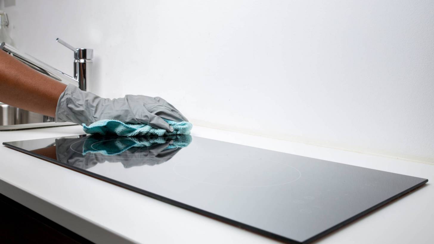 cleaning the surface of a kitchen