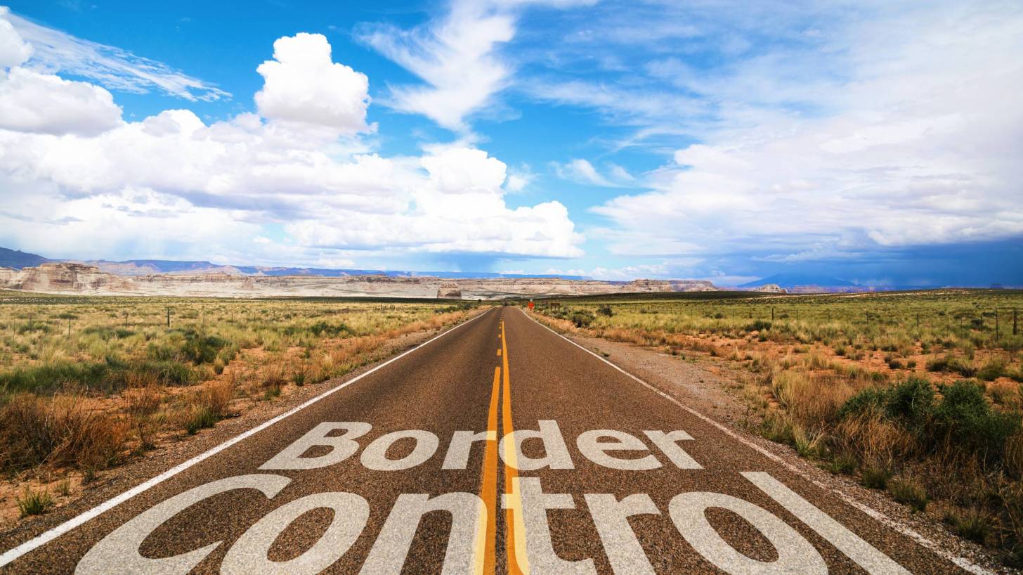 border control sign on the road
