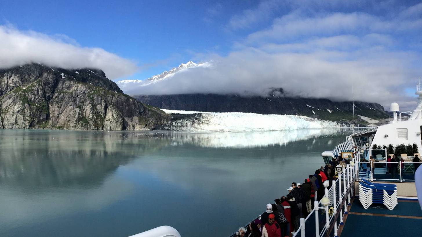 Alaskan cruise ship passing by a glacier