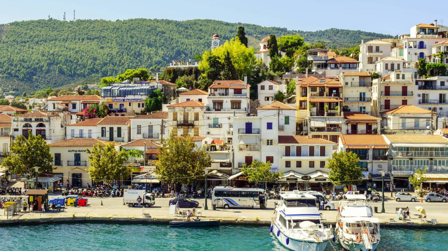 greece islands with boats and people in the market