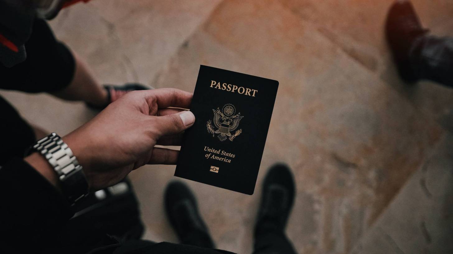 us passport in travelers hand