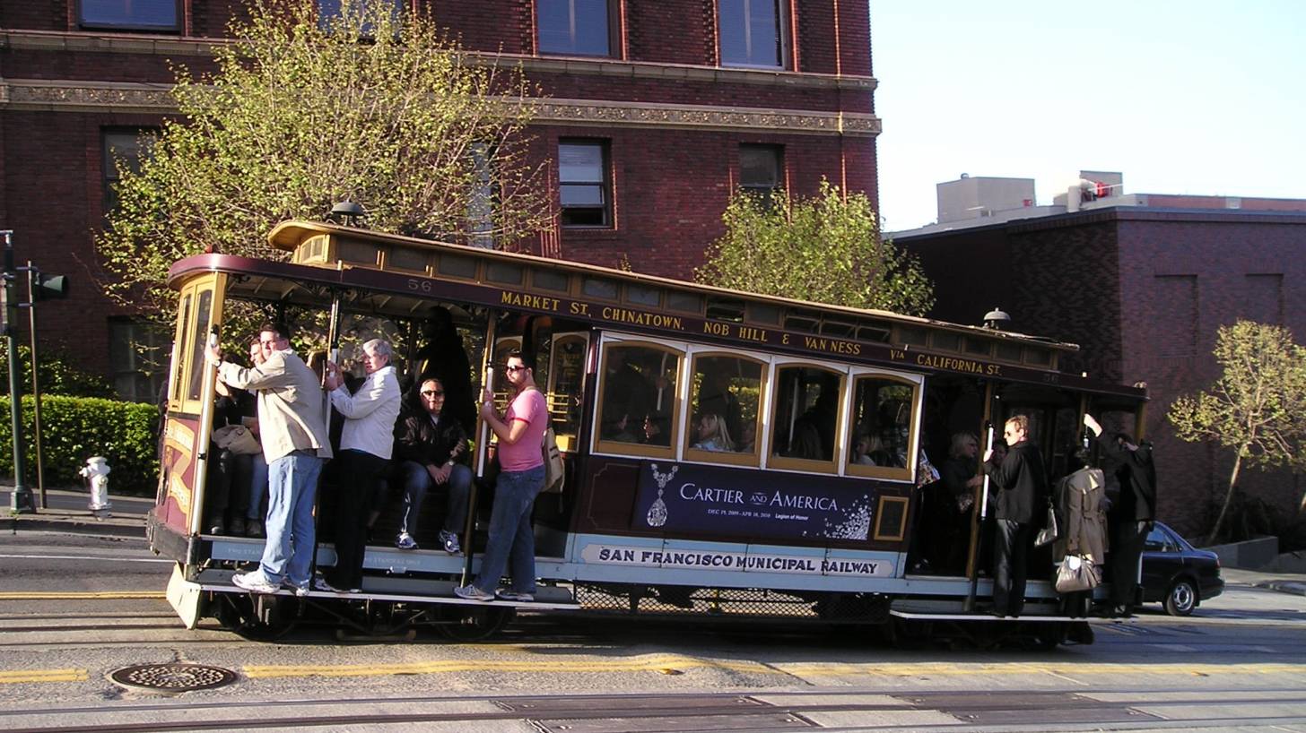 SF cable car people riding
