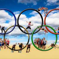 olympic rings and athletes