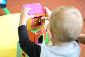child playing at a day care center