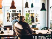 older men sitting in a cafe