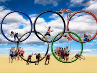 olympic rings and athletes