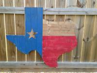 texas state carved out in a block of wood
